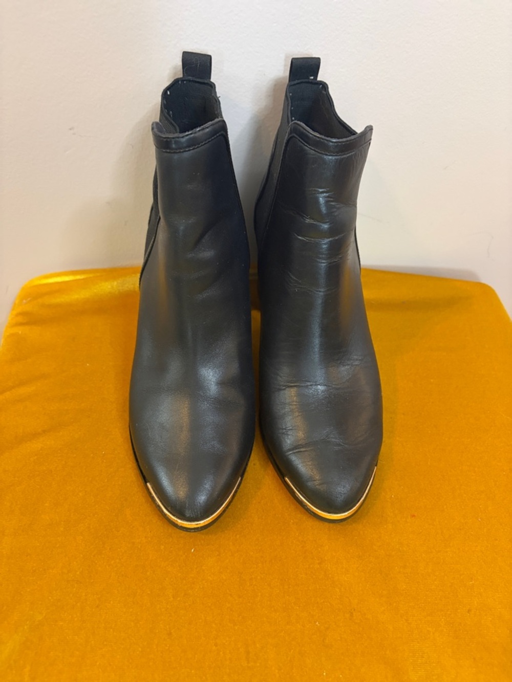 Ted Baker London Black Leather Pointed Toe Ankle Booties with Gold Accent